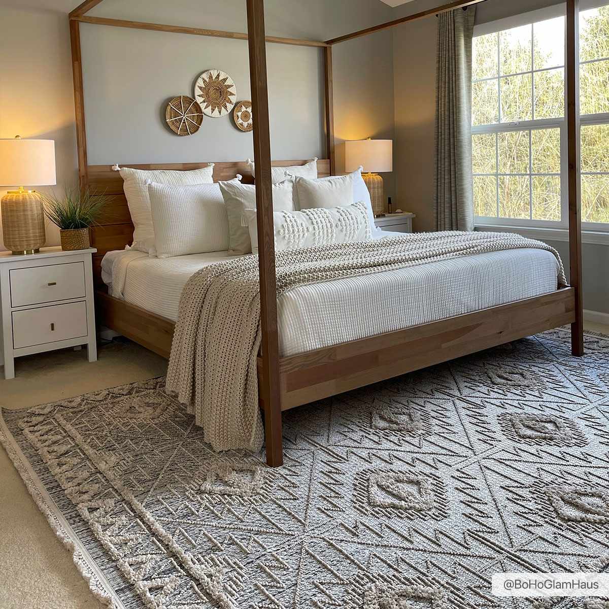 Agoo High-Low Pile Rustic Rug in neutral gray with a textured geom pattern under a wood bed on Tampa Home & Garden Store