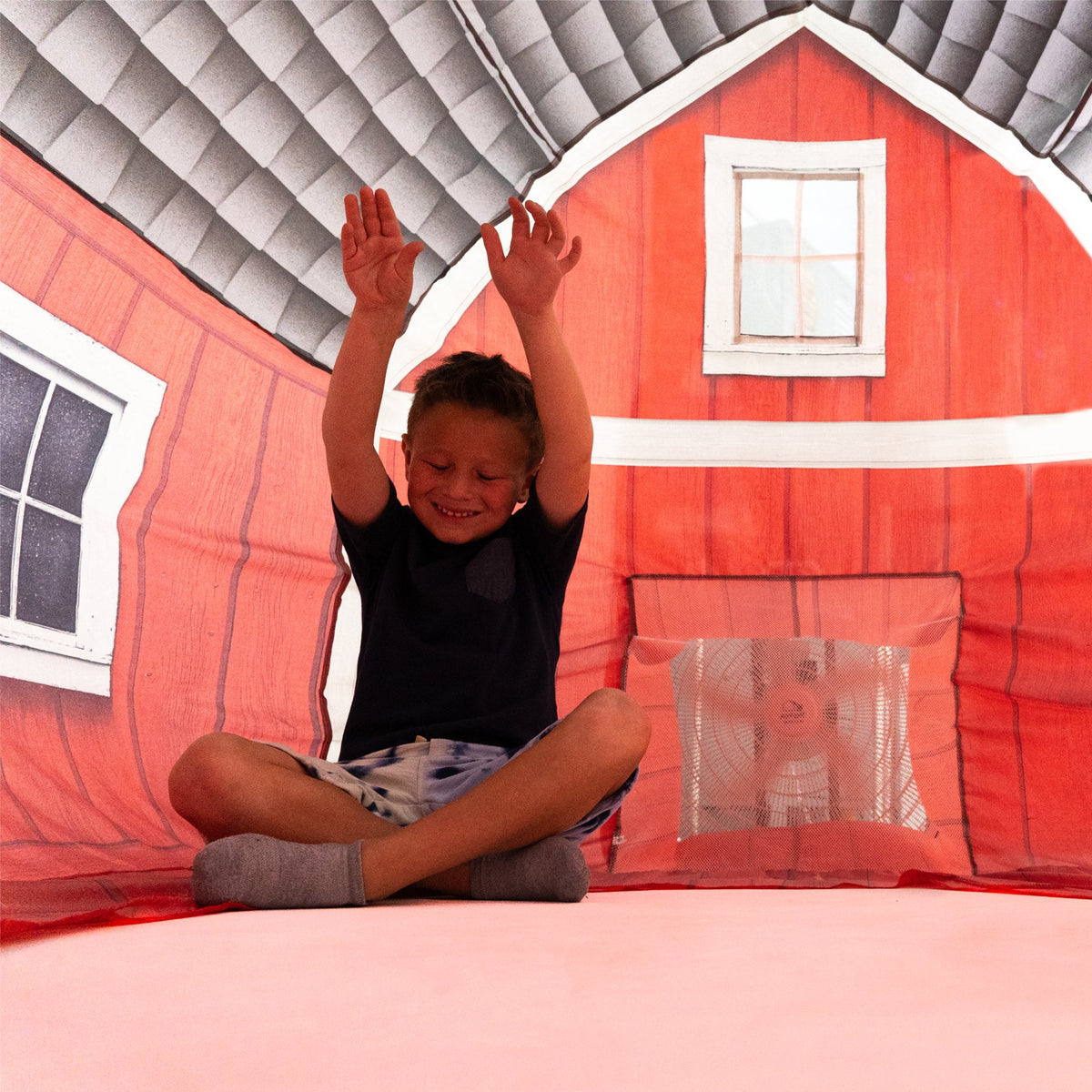 AirFort Farmers Barn inflatable play fort for kids with red barn walls on Tampa Home & Garden Store