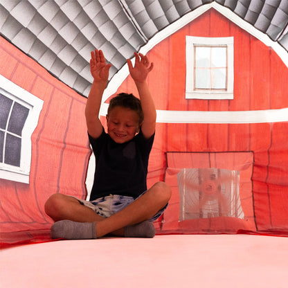 AirFort Farmers Barn inflatable play fort for kids with red barn walls on Tampa Home & Garden Store