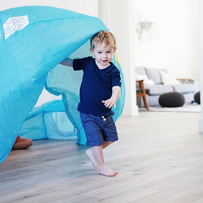 AirFort Beach Ball blue inflatable kids play fort set up indoors with child on Tampa Home & Garden Store