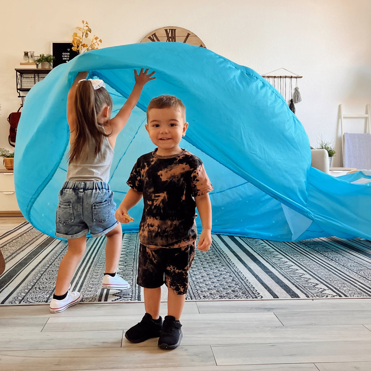 AirFort Constellation glow-in-the-dark inflatable play fort in bright blue with children inside on Tampa Home & Garden Store