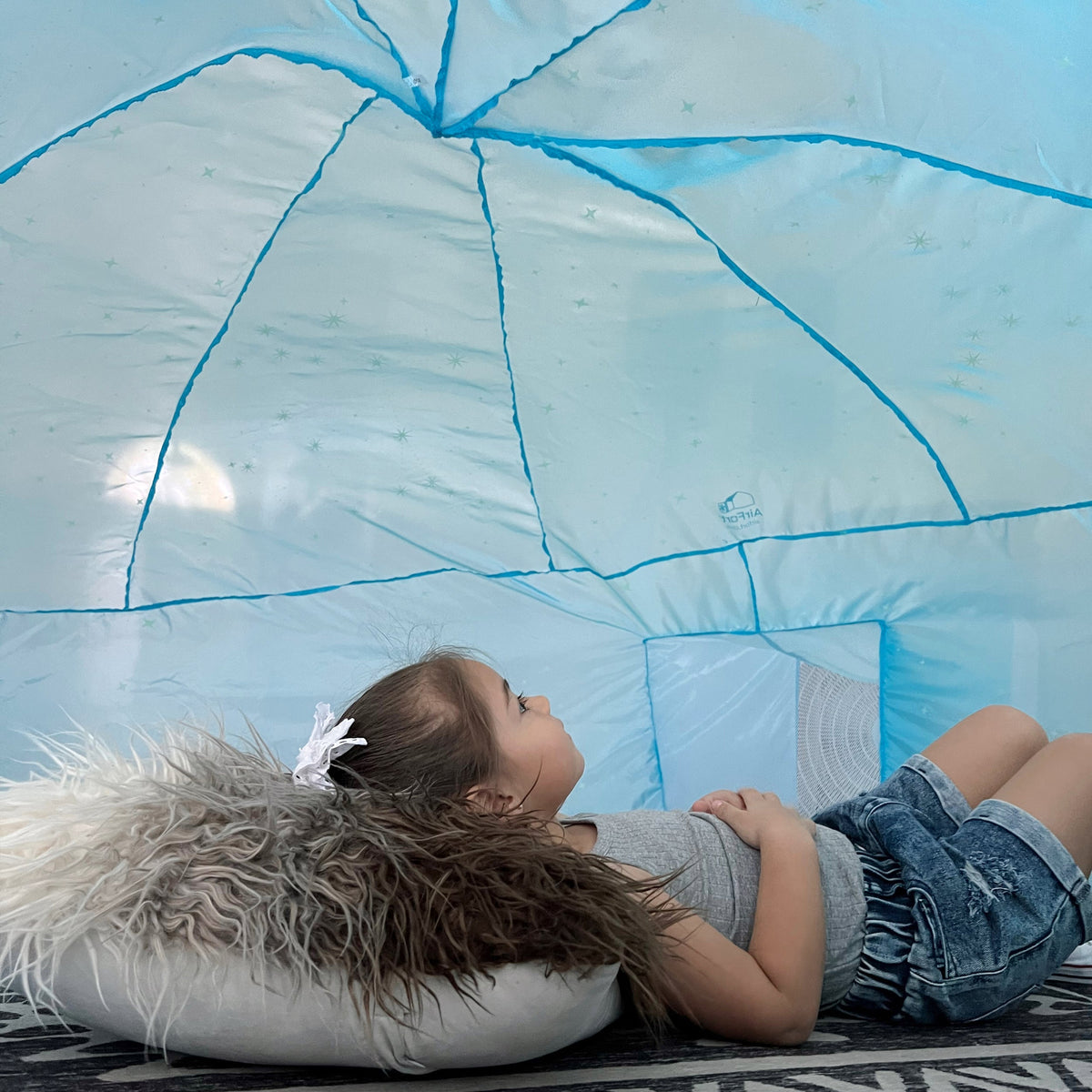 AirFort Constellation glow-in-the-dark inflatable play fort with blue seams; 2 kids inside on Tampa Home & Garden Store