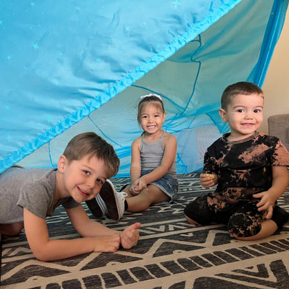 AirFort Constellation Glow-in-the-Dark Inflatable Play Fort blue starry interior, kids inside on Tampa Home & Garden Store