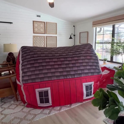 AirFort Farmers Barn inflatable play fort, red barn exterior with grey quilted roof on Tampa Home & Garden Store