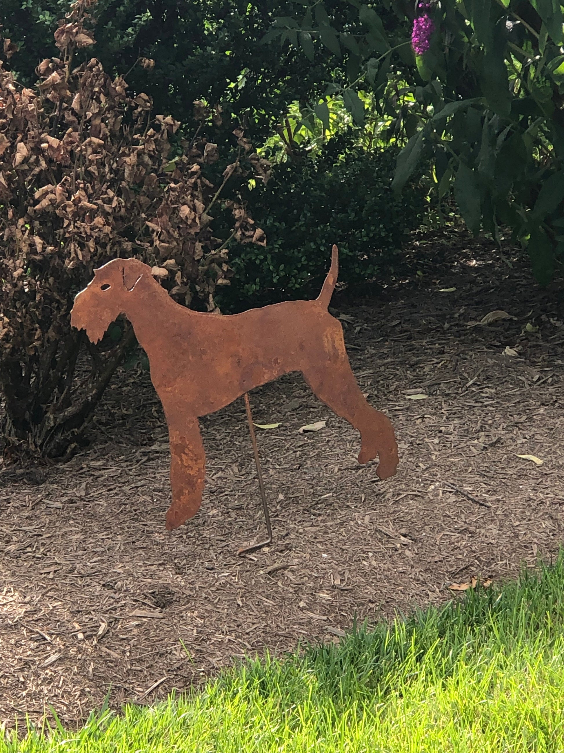 Rusted metal Airedale Terrier garden stake by Rustica Ornamentals on Tampa Home & Garden Store