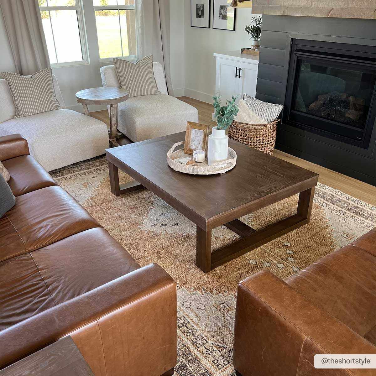 Albas Washable Area Rug by Boutique Rugs in neutral beige with subtle border in living room on Tampa Home & Garden Store