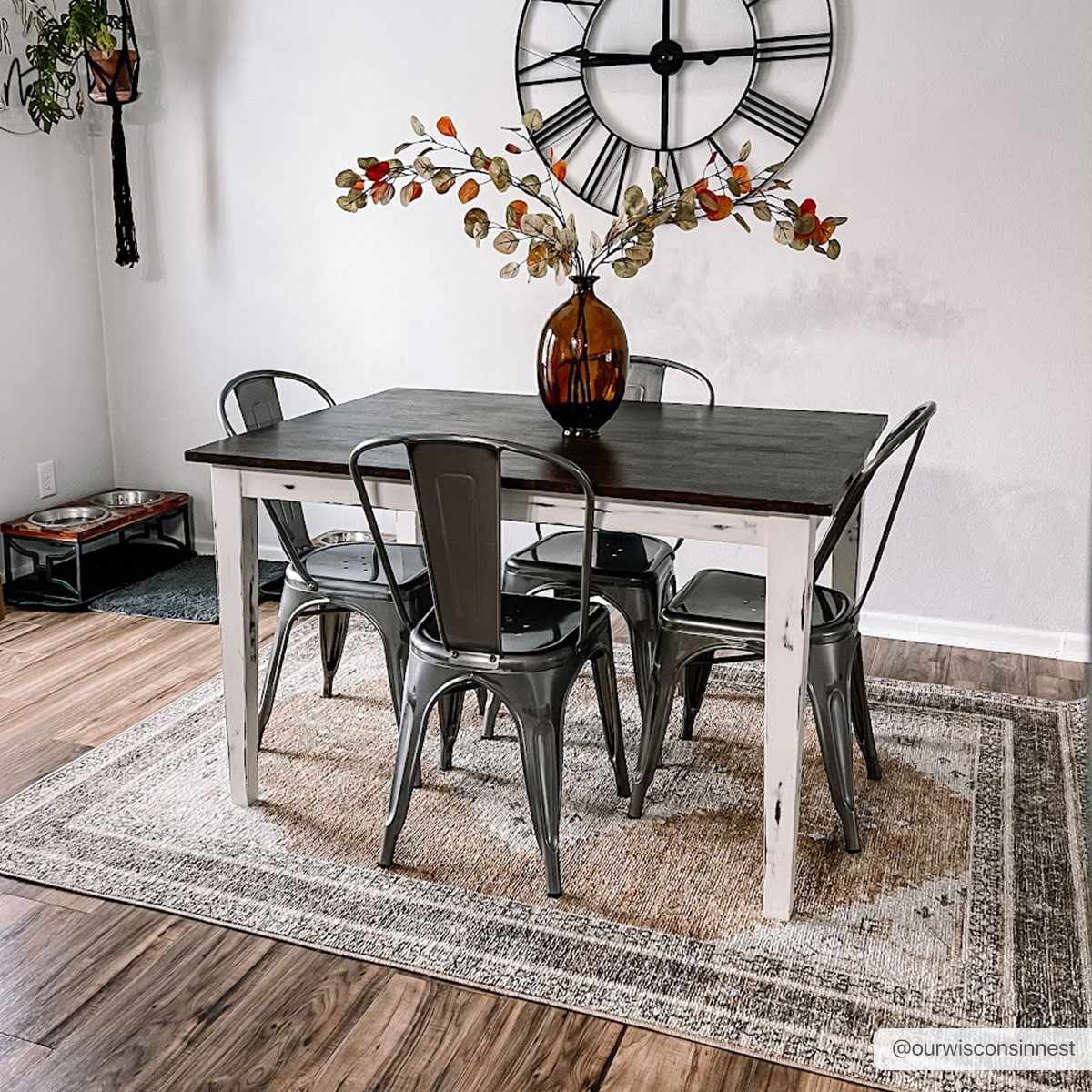 Albas Washable Area Rug by Boutique Rugs under a rustic white dining table with metal chairs on Tampa Home & Garden Store