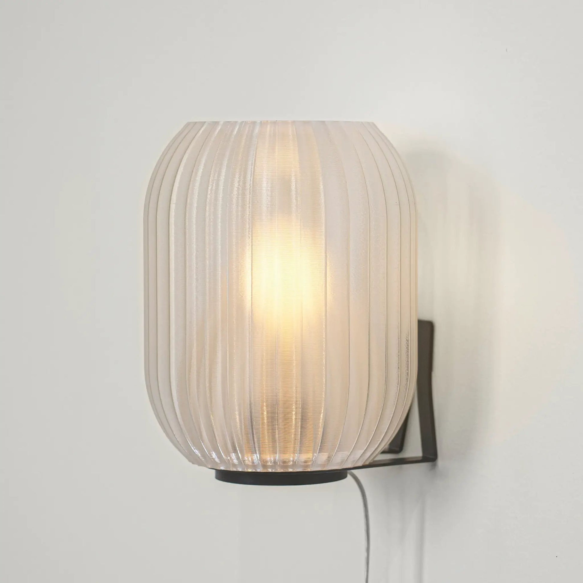 Allium Sconce wall light with off-white ribbed glass shade and dark metal mount Wooj Design on Tampa Home & Garden Store