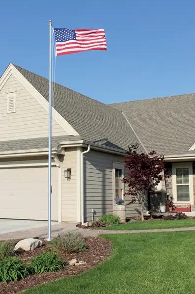 Flagpole 20’ aluminum 3-section with USA flag in front yard Flagman of America on Tampa Home & Garden Store
