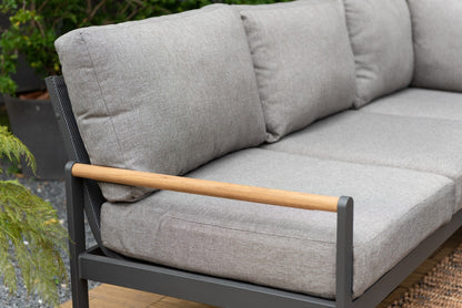 Amber Sectional Coffee Set, gray cushions with wood armrests on dark metal balcony frame on Tampa Home & Garden Store