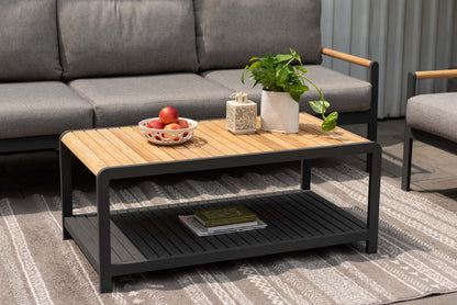 Amber teak and aluminum rectangular coffee table with wood slat top and black frame on Tampa Home & Garden Store
