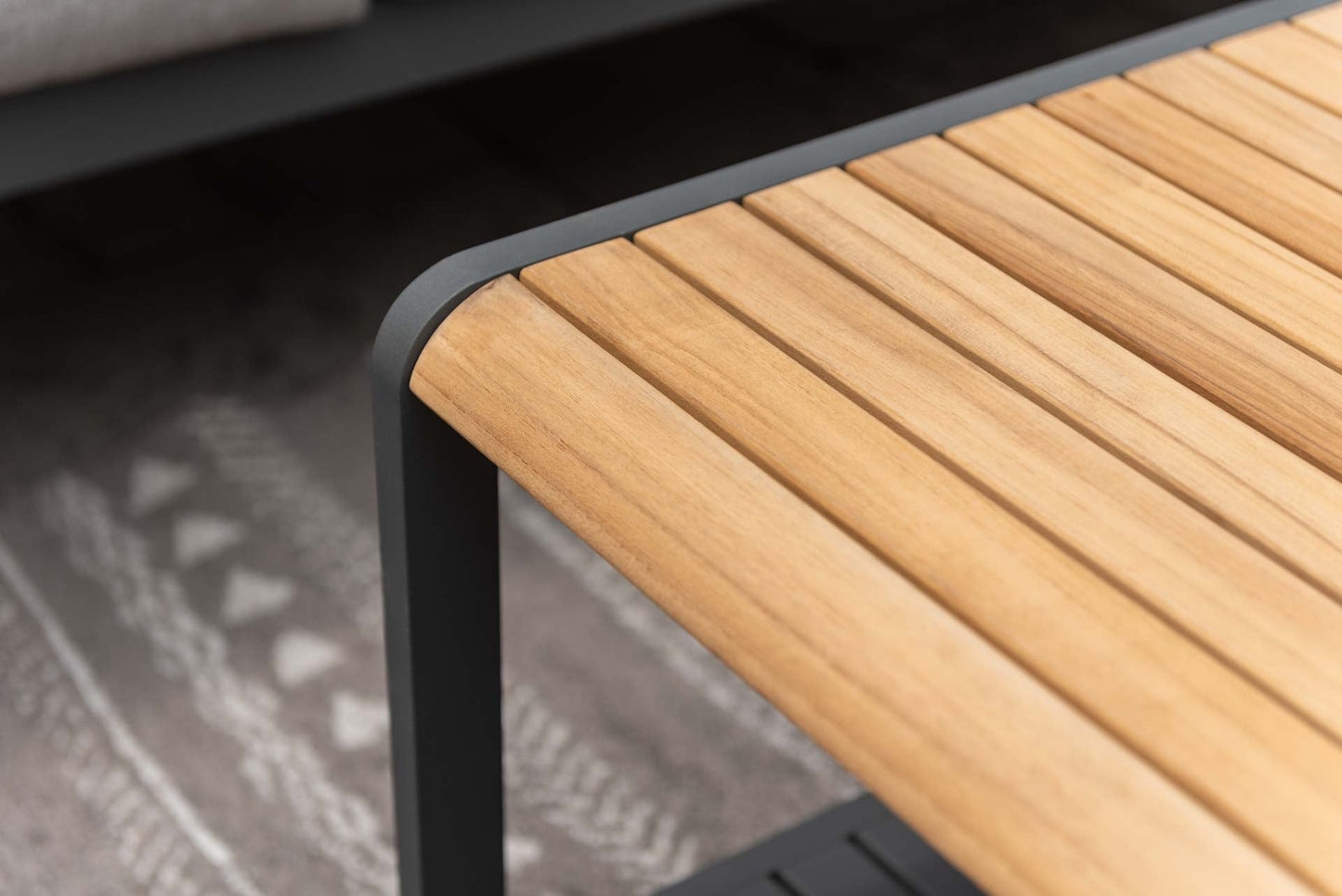 Amber Teak and Aluminum Rectangular Coffee Table with slatted teak top and gray frame on Tampa Home & Garden Store