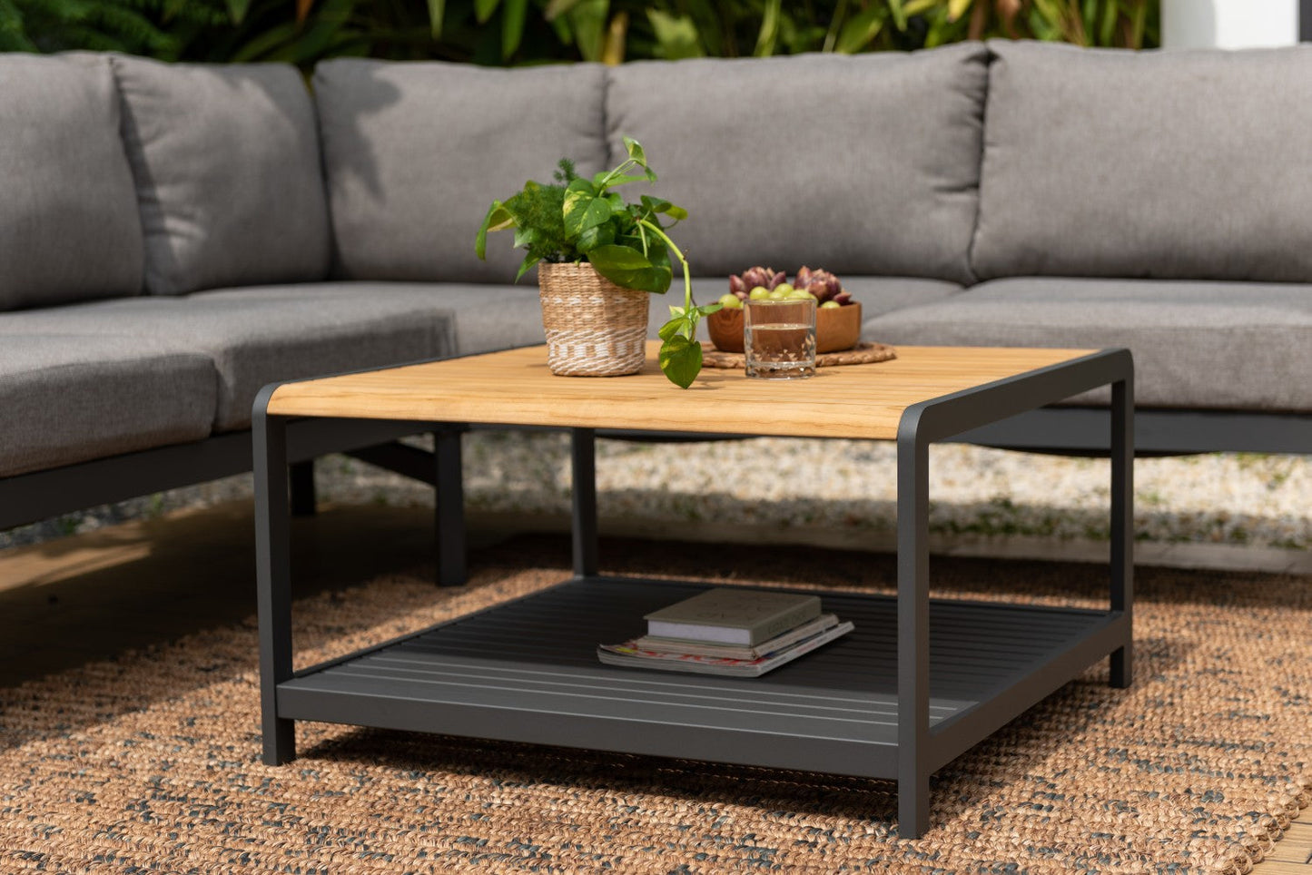 Amber Sectional Coffee Set outdoor table with amber wood top and dark gray frame on Tampa Home & Garden Store