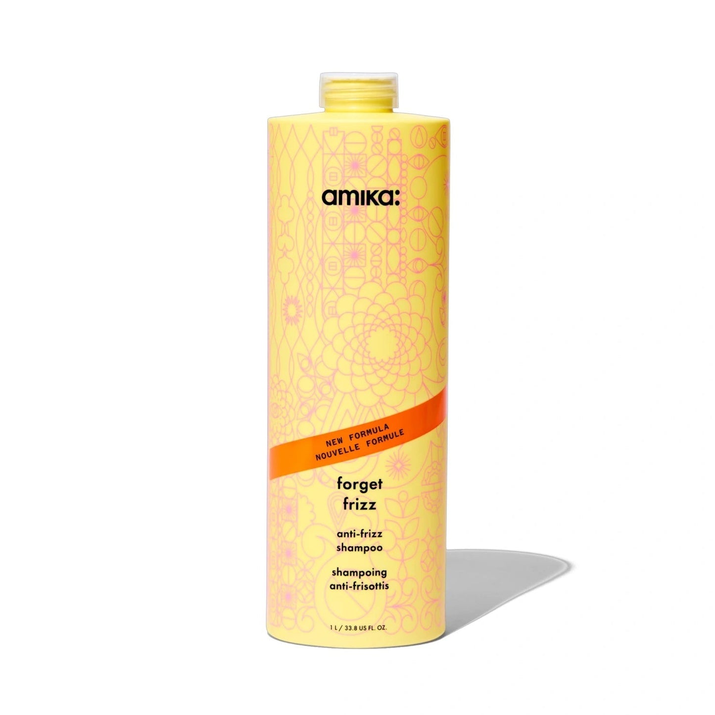 Amika Forget Frizz anti-frizz shampoo bottle, yellow bottle, pink pattern and orange accent on Tampa Home & Garden Store