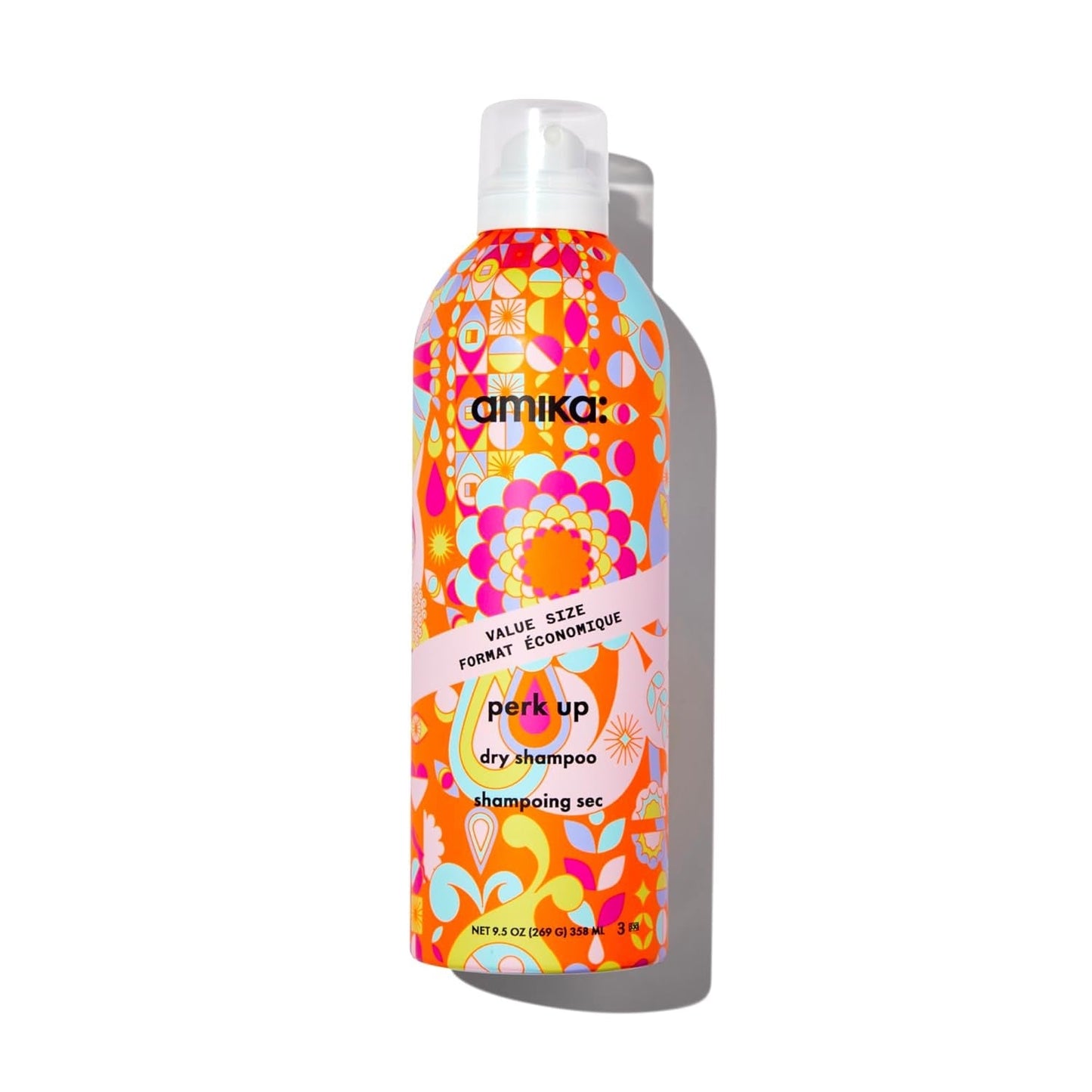 Amika Perk Up talc-free dry shampoo bottle with vibrant orange pink floral pattern on Tampa Home & Garden Store