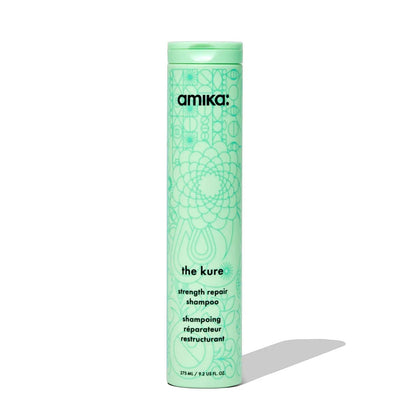 Amika The Kure Bond Repair Shampoo bottle in mint green with floral motif Nava Beauty packaging on Tampa Home & Garden Store