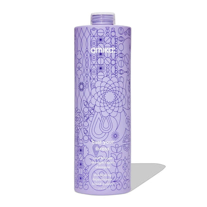 Amika Bust Your Brass Cool Blonde Repair Shampoo bottle, purple with intricate geometric pattern on Tampa Home & Garden Store