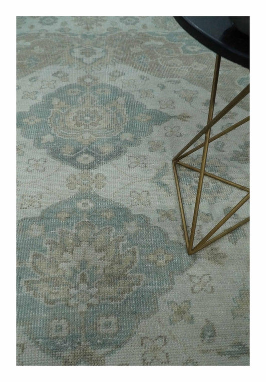 Antique medallion wool area rug in ivory and camel tones on Tampa Home & Garden Store