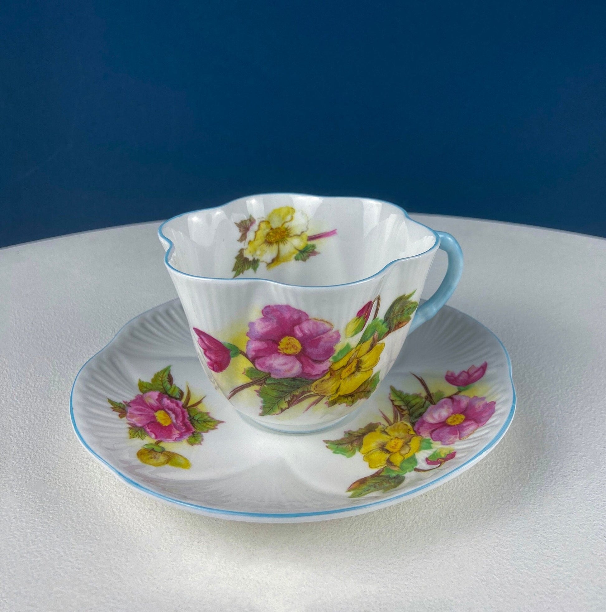 Antique Shelley Cup and Saucer with Begonia Motif . Beautiful, Fine Porcelain. Colorful Flowers and Blue Handle. French Country Living. - Tampa Home & Garden Store
