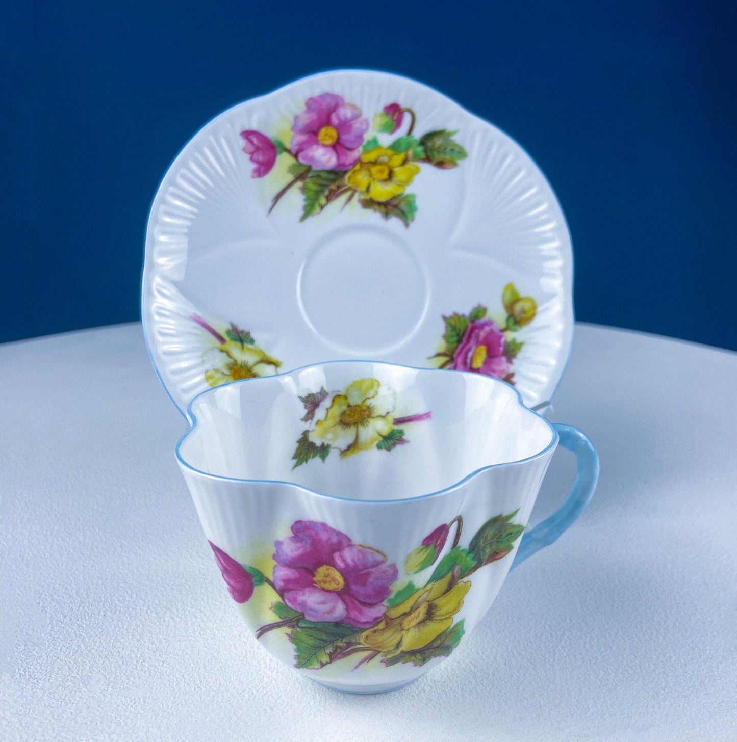 Antique Shelley Cup and Saucer with Begonia Motif . Beautiful, Fine Porcelain. Colorful Flowers and Blue Handle. French Country Living. - Tampa Home & Garden Store