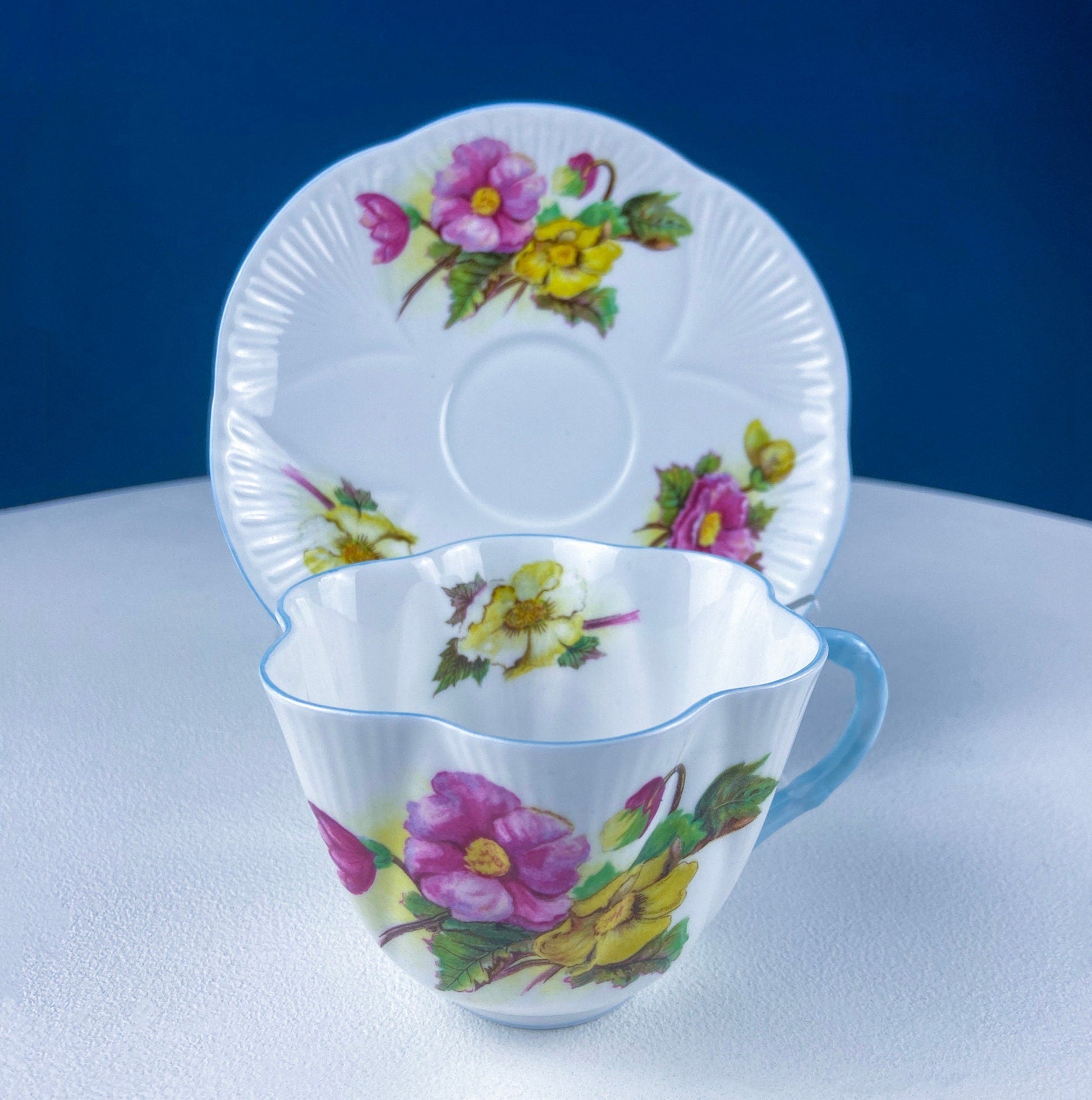 Antique Shelley Cup and Saucer with Begonia Motif . Beautiful, Fine Porcelain. Colorful Flowers and Blue Handle. French Country Living. - Tampa Home & Garden Store