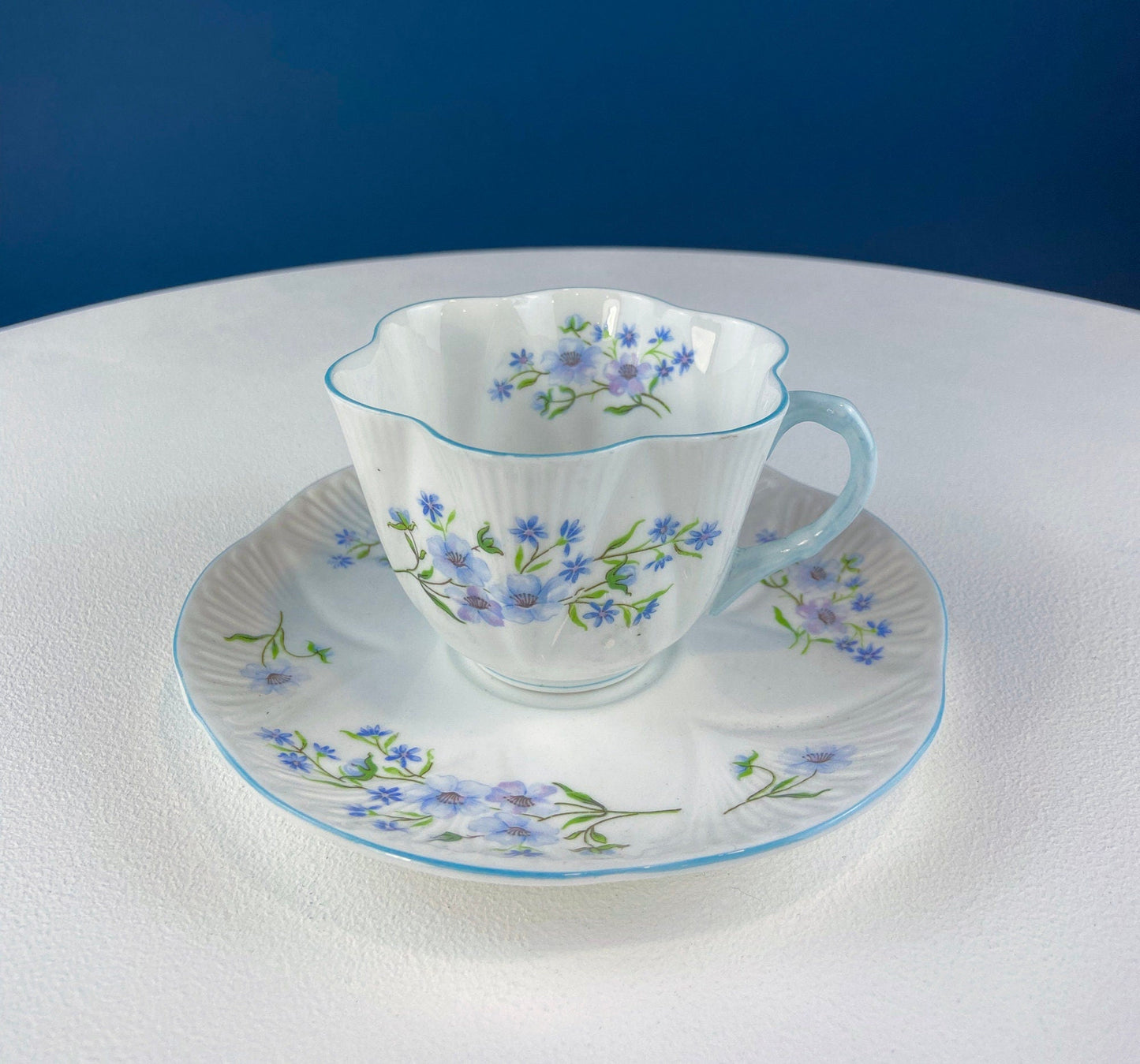 Antique Shelley Cup and Saucer with Begonia Motif . Beautiful, Fine Porcelain. Colorful Flowers and Blue Handle. French Country Living. - Tampa Home & Garden Store