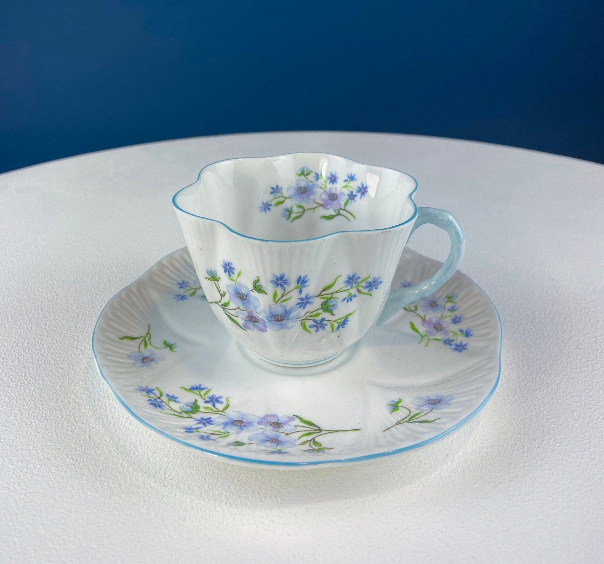 Antique Shelley Cup and Saucer with Begonia Motif . Beautiful, Fine Porcelain. Colorful Flowers and Blue Handle. French Country Living. - Tampa Home & Garden Store
