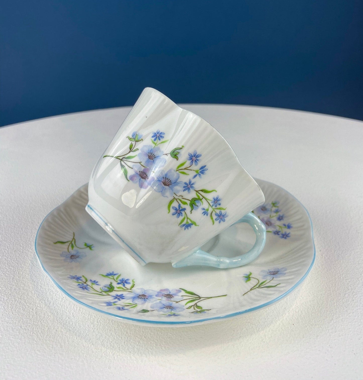 Antique Shelley Porcelain Cup and Saucer: Blue Rock Floral Pattern - Tampa Home & Garden Store