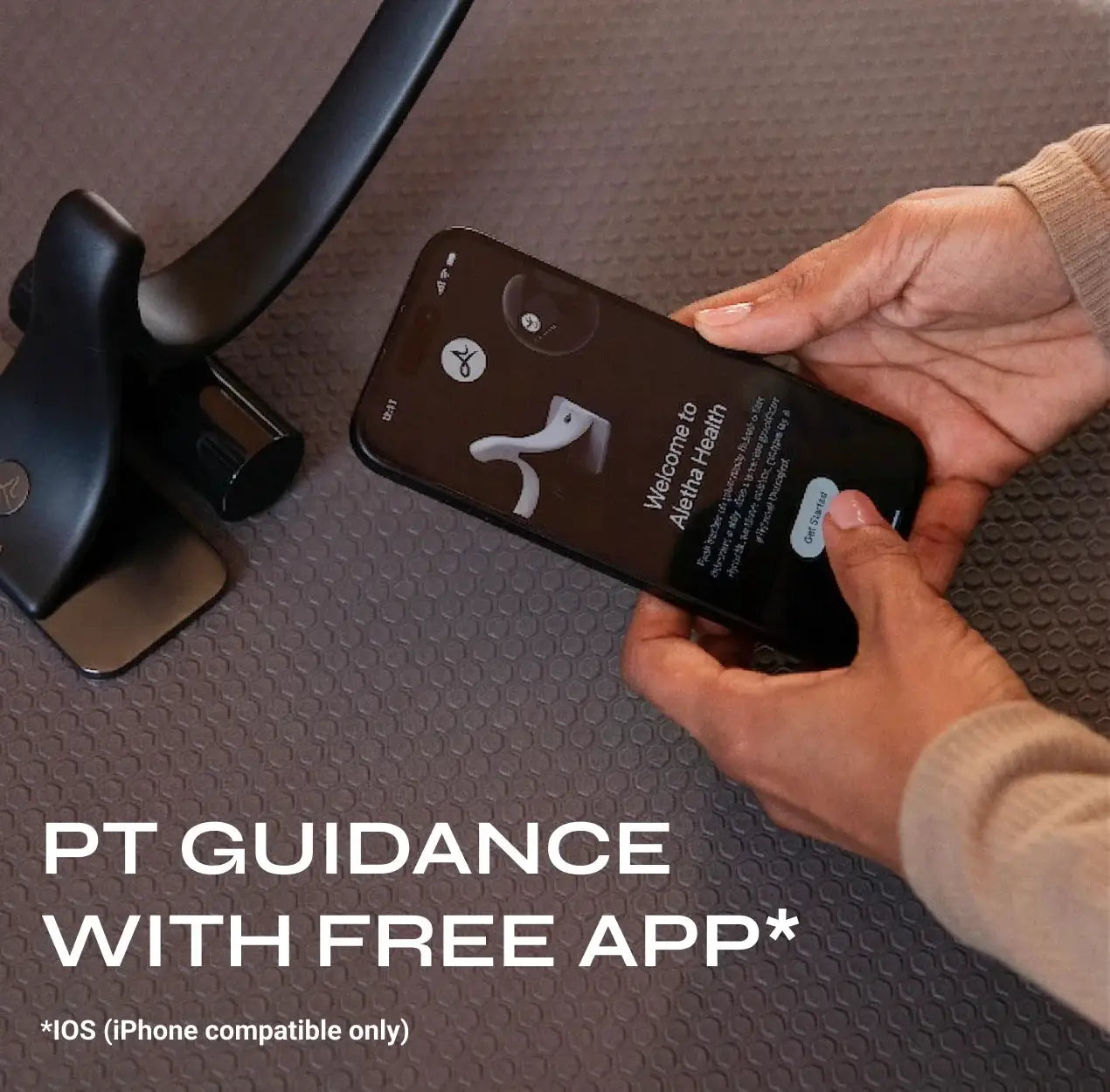 Orbit® muscle release tool by Aletha Health in black, app-guided therapy on smartphone on Tampa Home & Garden Store