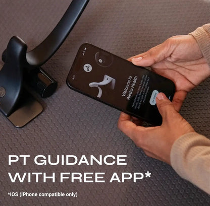 Orbit® muscle release tool by Aletha Health in black, app-guided therapy on smartphone on Tampa Home & Garden Store