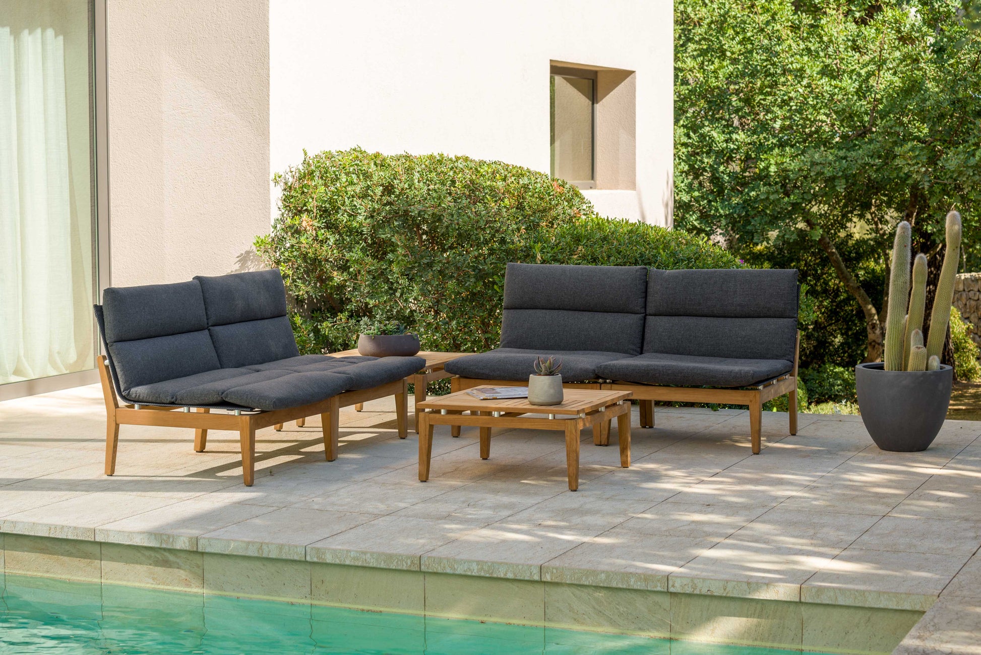 Arno 6pc Corner Set Dark outdoor lounge set with charcoal cushions on wooden frames on Tampa Home & Garden Store