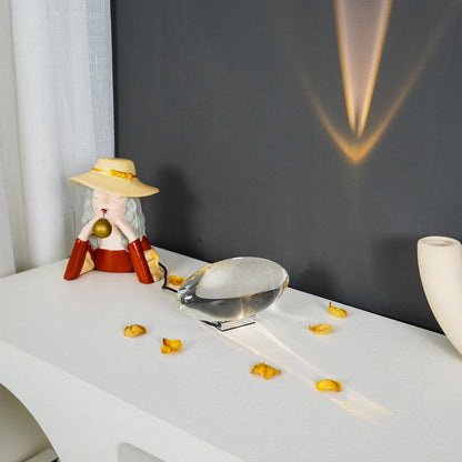 Seren crystal glass table lamp on white desk beside a decorative figurine on Tampa Home & Garden Store