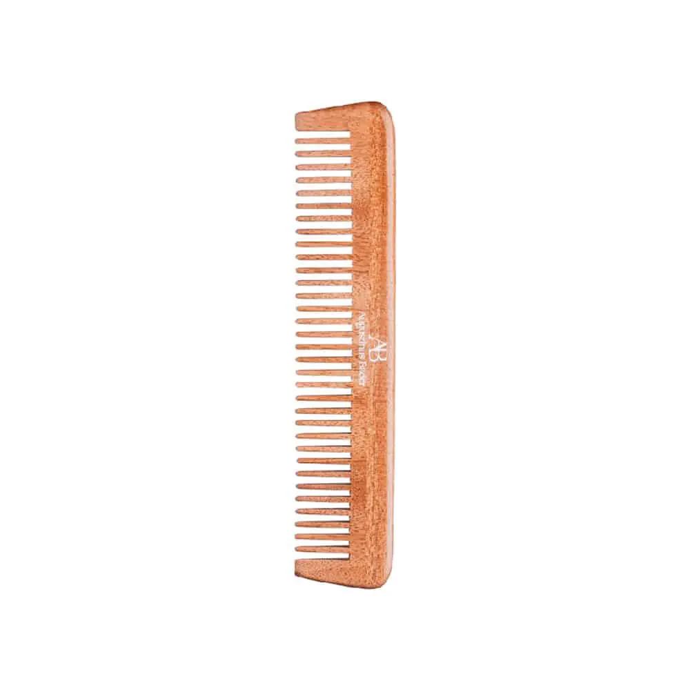Neem comb Nava Beauty copper-toned fine-tooth hair care tool on Tampa Home & Garden Store