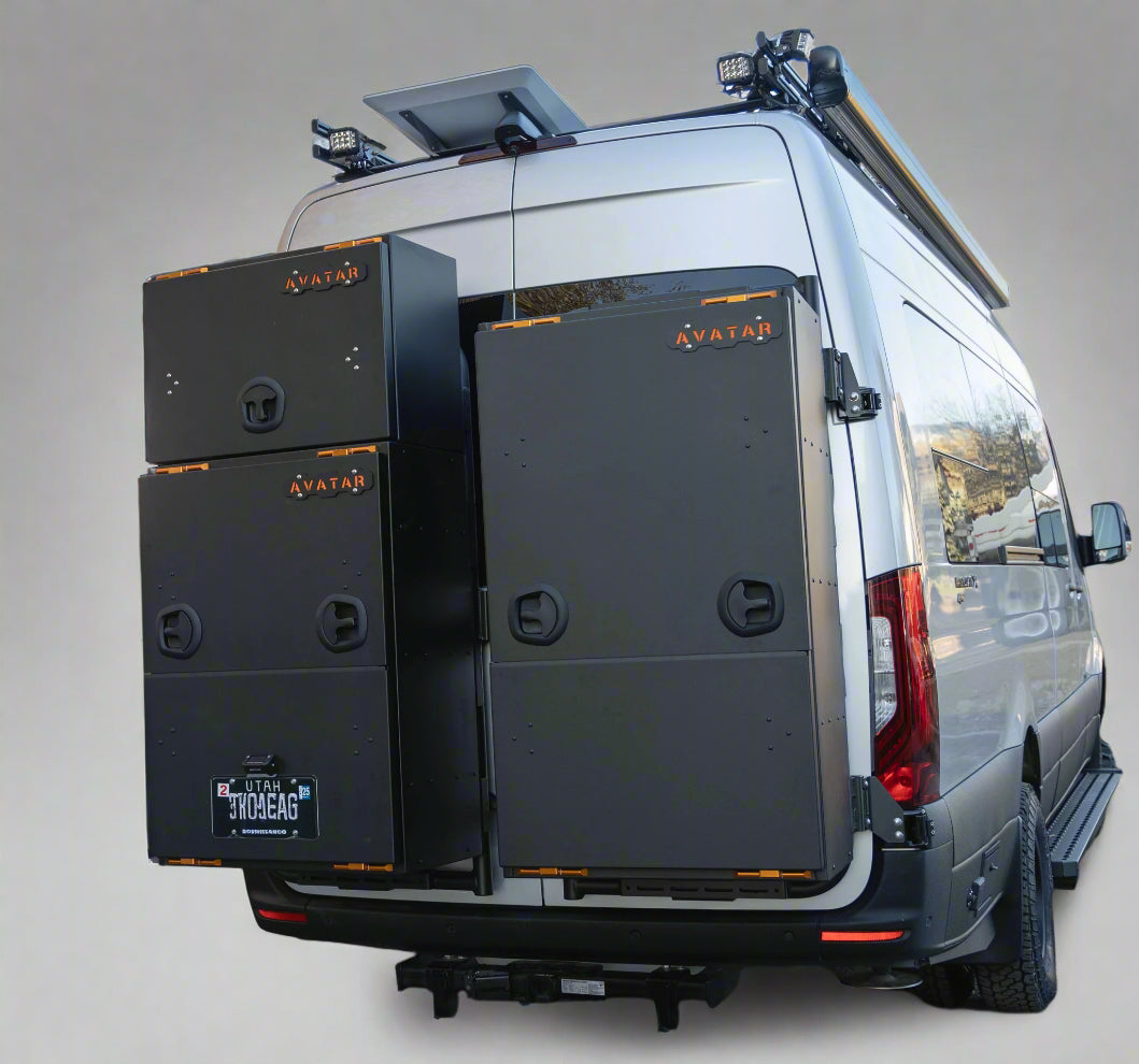 Avatar Giga Largest Storage Box three metal cargo boxes on rear of white van with orange latch on Tampa Home & Garden Store