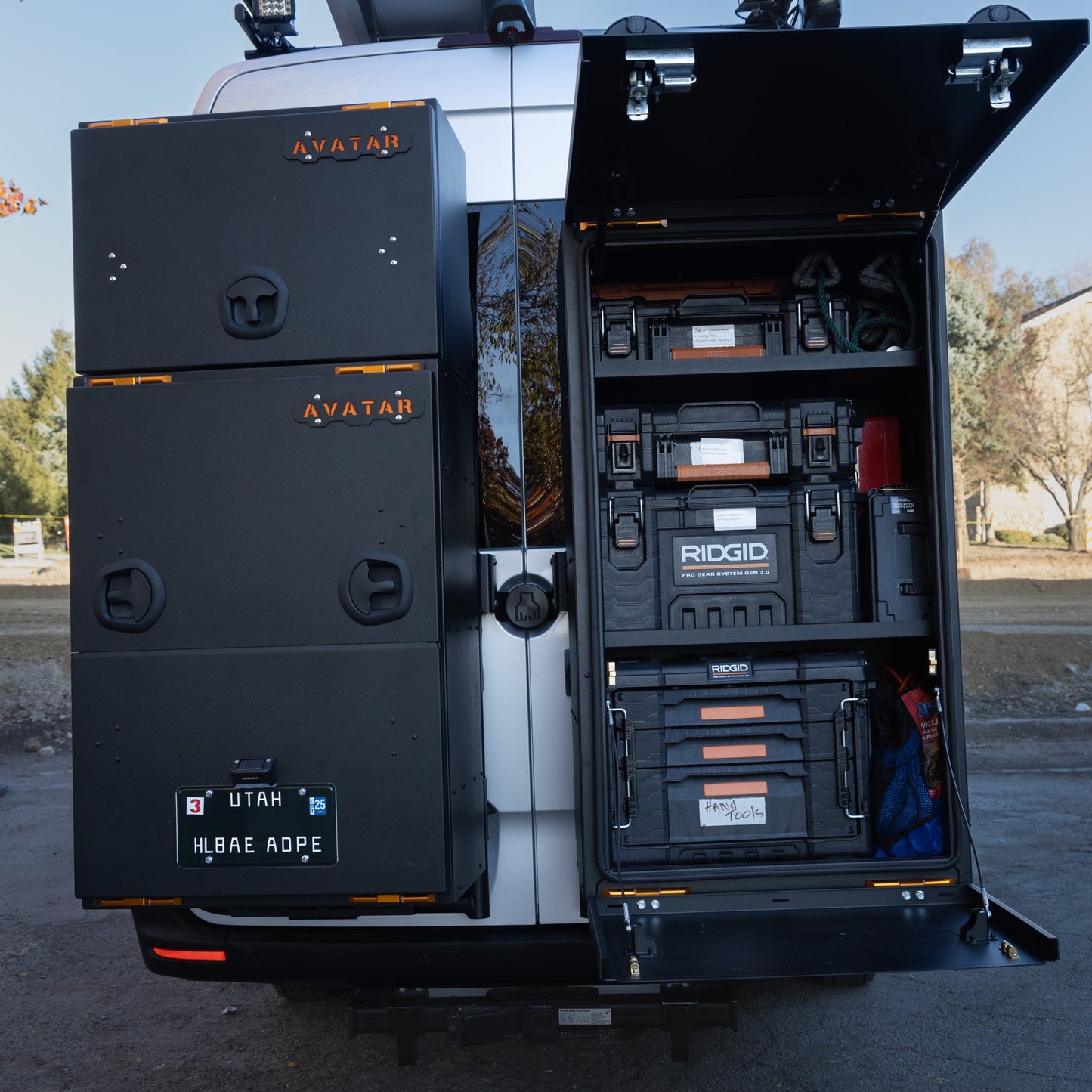 Avatar Giga Largest Storage Box black with orange logo on vehicle side with RIDGID tool drawers on Tampa Home & Garden Store