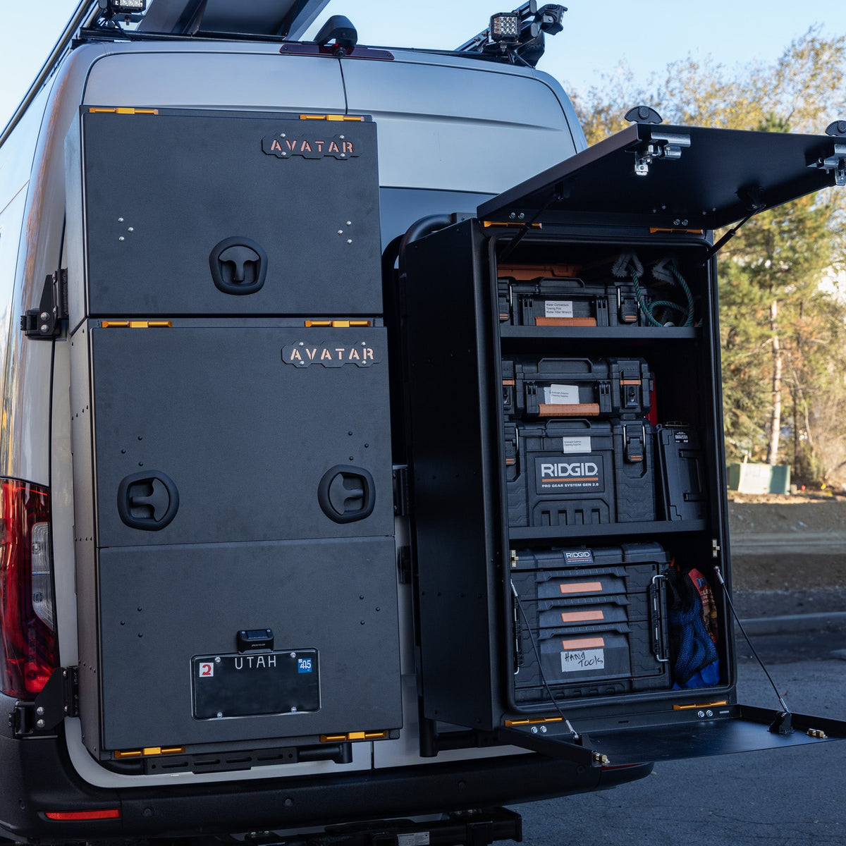 Avatar Giga Largest Storage Box black metal mounted on vehicle rear rack on Tampa Home & Garden Store