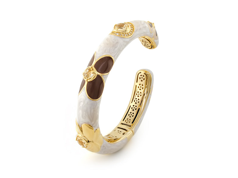 Falling Flowers hinged bangle by Lauren G Adams, marbled enamel with gold-tone floral accents on Tampa Home & Garden Store
