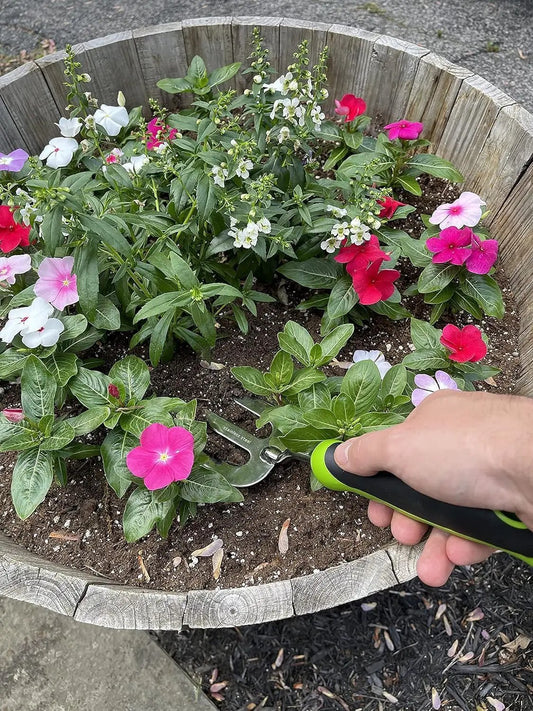 Garden Hand Fork Weeder Tool stainless steel lime-green handle in a wooden planter with impatiens on Tampa Home & Garden Store