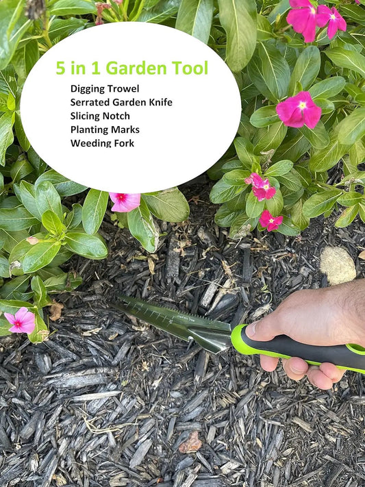 Stainless Steel 5 in 1 Trowel with lime-green handle by Garden Guru, in mulch with pink flowers on Tampa Home & Garden Store