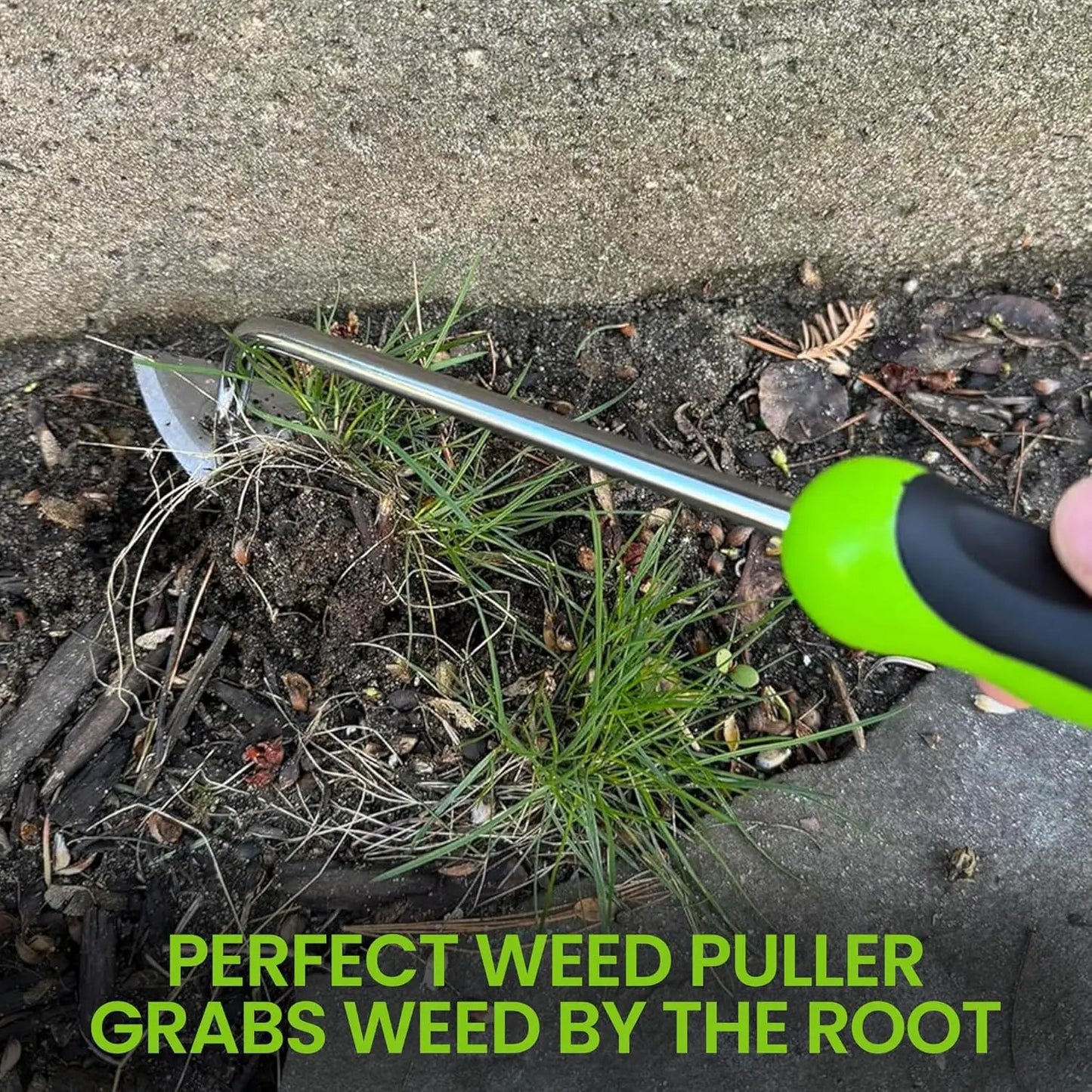 Garden Guru Root Weeder Tool with ergonomic green handle and metal shaft pulling weed from soil on Tampa Home & Garden Store