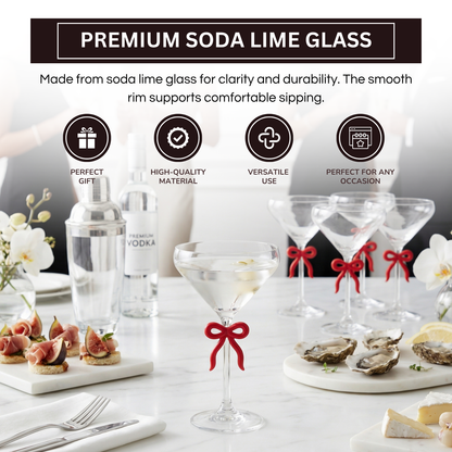 Single Clear Martini Glass With A Red Bow Stem