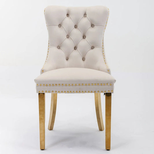 Tufted velvet beige dining chair with gold nailhead trim and legs on Tampa Home & Garden Store