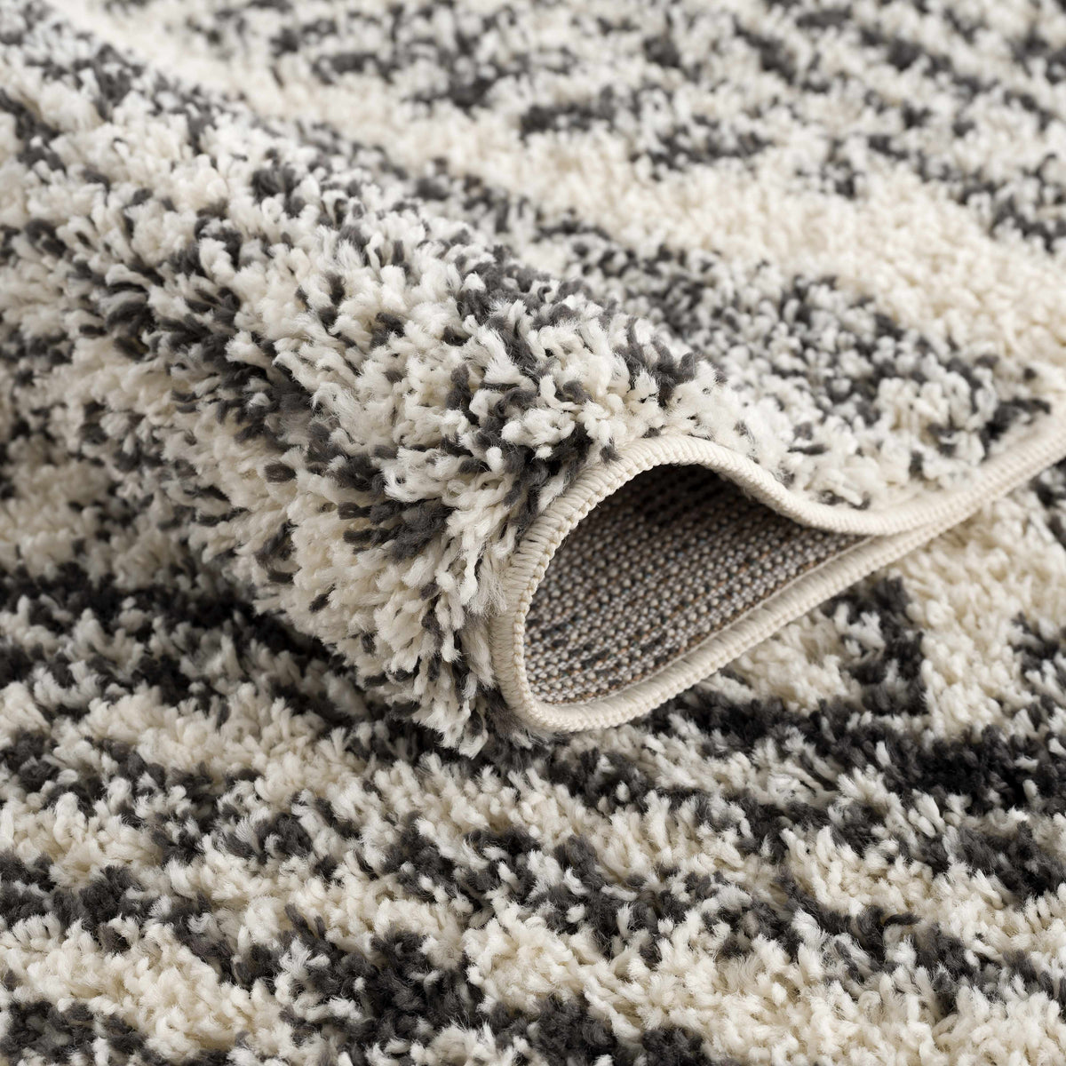 Fishhook Berber Shag Rug by Boutique Rugs in black, white and gray, plush shag texture on Tampa Home & Garden Store