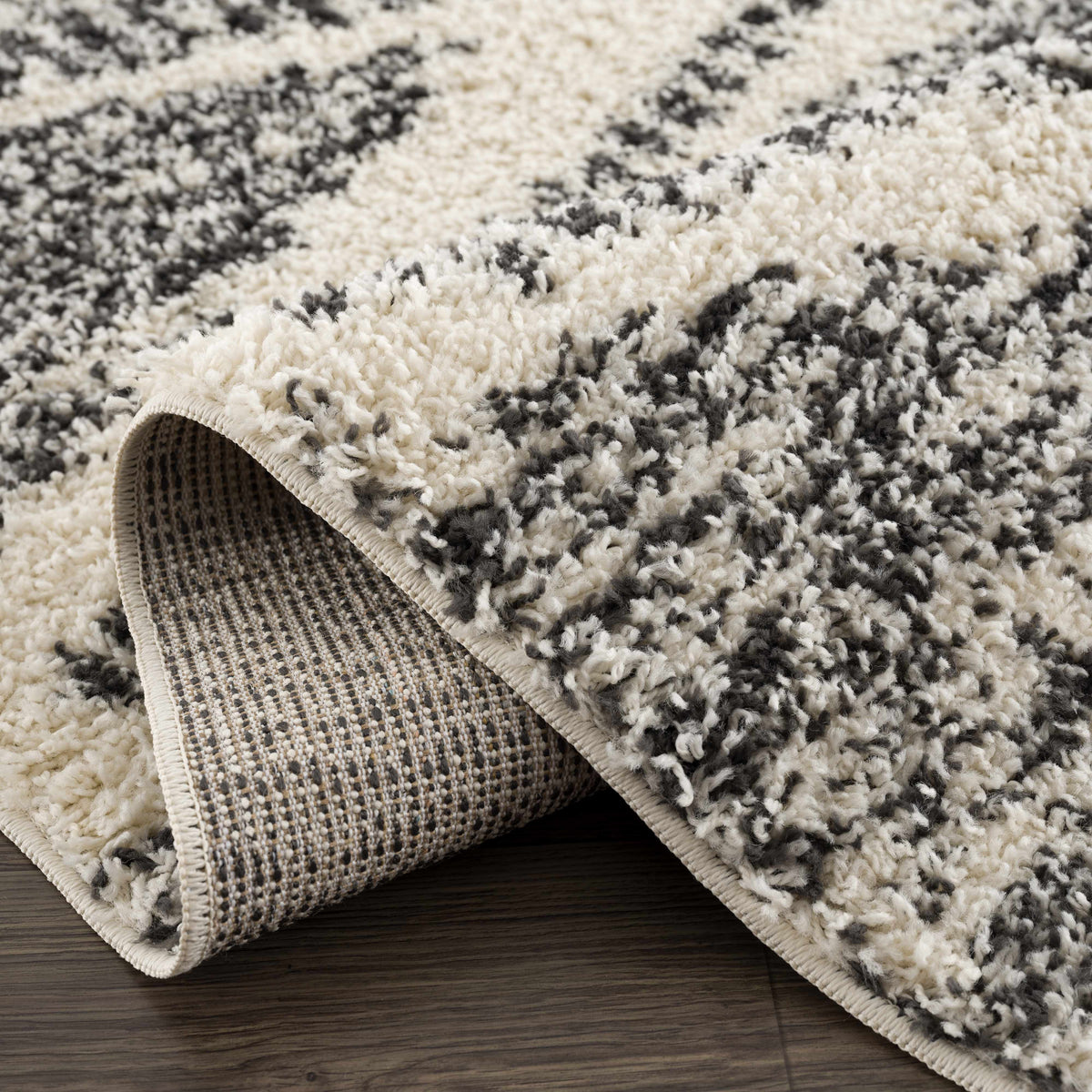 Fishhook Berber Shag Rug from Boutique Rugs in cream and gray with plush pile and bound edge on Tampa Home & Garden Store