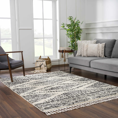 Fishhook Berber Shag Rug in black and ivory with fringe for living room decor on Tampa Home & Garden Store