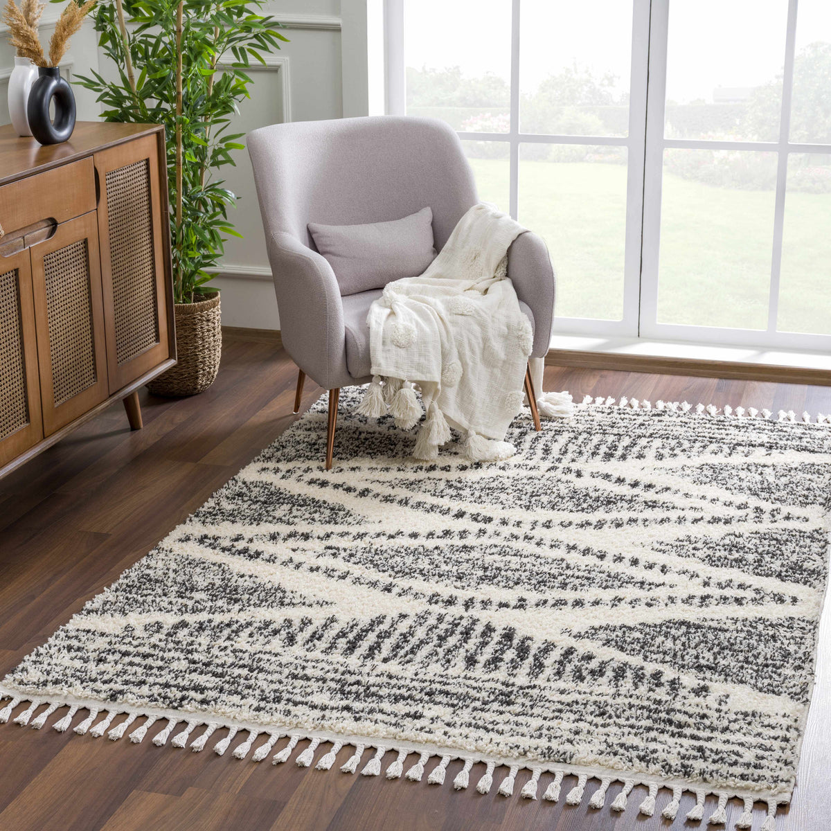 Fishhook Berber Shag Rug in black ivory stripes with tassel fringe Boutique Rugs on Tampa Home & Garden Store