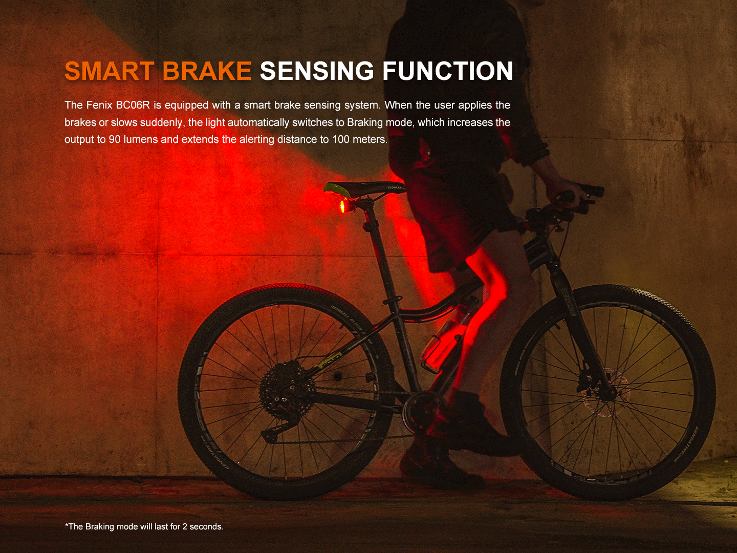 Fenix BC06R bike taillight rear light on a black bike, red braking glow in a dark scene on Tampa Home & Garden Store