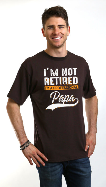 Spun Bamboo men's dark brown tee with I’M NOT RETIRED I’M A PROFESSIONAL Papa on Tampa Home & Garden Store