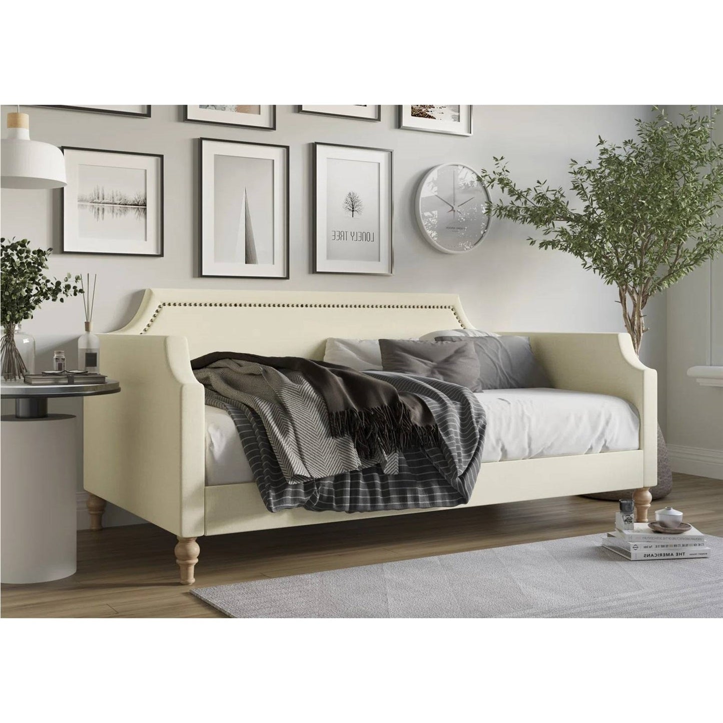 Sofá cama tapizado en tela de poliéster beige crema tamaño twin con ribete de tachuelas