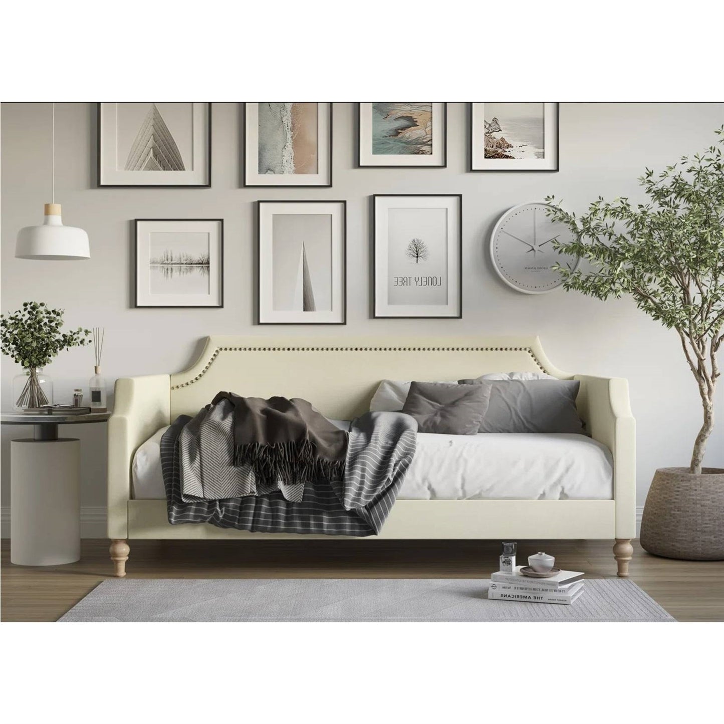Sofá cama tapizado en tela de poliéster beige crema tamaño twin con ribete de tachuelas
